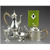 Image 1 : A good four-piece tea and coffee service,...