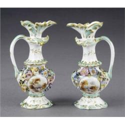 A pair of small ewers,...