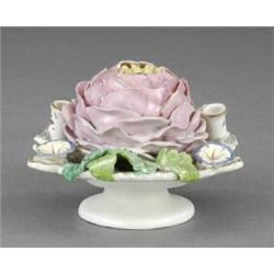 A circular inkwell and cover,...