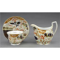 A Chamberlain's Worcester tea cup, saucer and oval cream jug,...