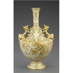 A Royal Worcester blush ivory bottle shape vase,...