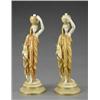 Image 1 : A pair of Royal Worcester matt ivory figures of lamp bearers,...