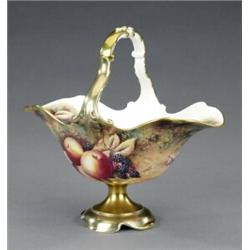 A Royal Worcester oval pedestal basket,...