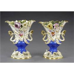 A pair of Coalport vases,...