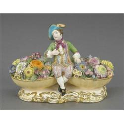 A Minton figure of a boy,...