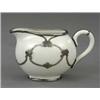 Image 1 : A Belleek oval cream jug,...