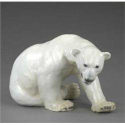 A Bing & Grondahl large model of a seated turning polar bear,...