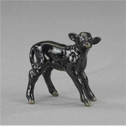 A Beswick model of an Aberdeen Angus calf,...
