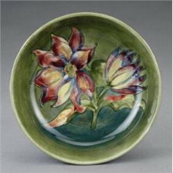 A Moorcroft Clematis pattern shallow bowl,...