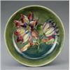 Image 1 : A Moorcroft Clematis pattern shallow bowl,...