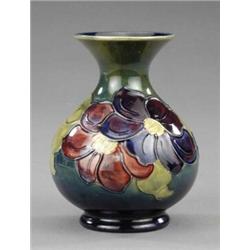 A Moorcroft Clematis pattern baluster vase,...