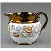 Image 1 : A copper lustre bulbous jug,...