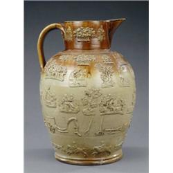 An unusually large Staffordshire stoneware pitcher,...