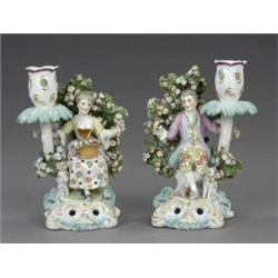 A pair of French candlesticks,...