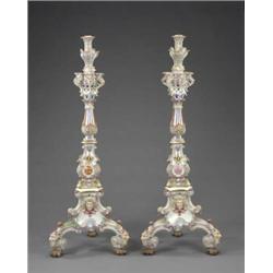 A pair of massive Meissen candelabra stands,...