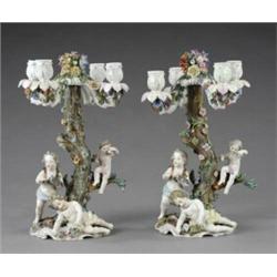 A pair of Dresden candelabra,...