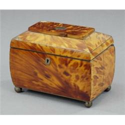 A Regency blonde tortoiseshell two compartment tea caddy,...