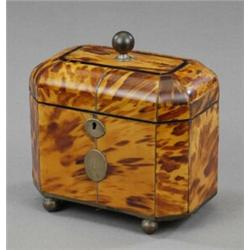 A Regency blonde tortoiseshell veneered two compartment tea caddy,...