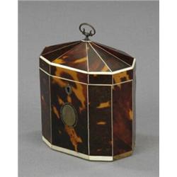 A George III tortoiseshell veneered single compartment tea caddy,...