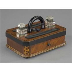 A Victorian walnut and ebonised inkstand,...