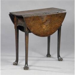 A small George II oak oval pembroke tea table,...