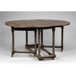 An oak oval gateleg table,...