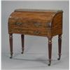 Image 1 : T. & G. Seddon - a good compact mahogany cylinder desk,...