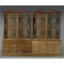 The two wings of a fine George III mahogany breakfront library bookcase,...