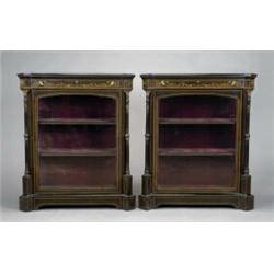 A pair of Victorian gilt-brass mounted inlaid and ebonised vitrines,...
