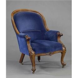 A William IV walnut armchair, of revived rococo design,...