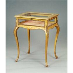A gilt-brass mounted painted giltwood table vitrine,...