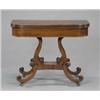 Image 1 : A Regency mahogany D-shaped folding tea table,...