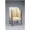 Image 1 : An Edwardian mahogany tall wingback armchair,...