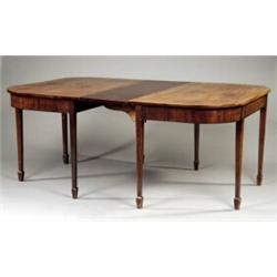 A George III mahogany dining table,...