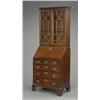 Image 1 : A small George II mahogany bureau-bookcase,...