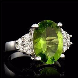 ONE OVAL CUT PERIDOT 5.29CTS, 2 ROUUND CUT DIAMONDS 0.22CTS