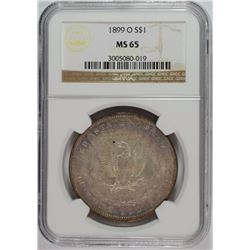 1899-O MORGAN DOLLAR NGC MS65 REVERSE BULL'S EYE RAINBOW TONE