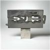 Image 1 : Vlavianos, untitled No. 10, 1985, polished steel, 17.75 x 24.5, Stamped signature 'Vlav...