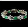 Image 1 : 14KT White Gold 21.63ctw Emerald and Diamond Bracelet