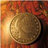 Image 1 : 1902 New Orleans Barber Quarter. F-12. Greysheet bid is $40.00.