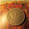 Image 2 : 1902 New Orleans Barber Quarter. F-12. Greysheet bid is $40.00.
