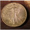 Image 1 : 1934 D Walking Liberty Half Dollar. Almost Uncirculated. Red Book value $85.00.