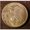 Image 2 : 1934 P Walking Liberty Half Dollar. Brilliant Uncirculated. Red Book value $110.00.