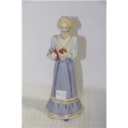 PORCELAIN TEACHER FIGURINE