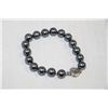 Image 1 : SEA SHELL PEARL BRACELET (GRAY COLOUR)