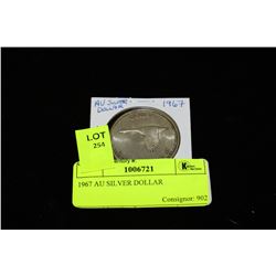 1967 AU SILVER DOLLAR