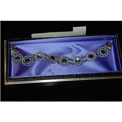 ESTATE BRACELET WITH IRRIDESCENT STONES