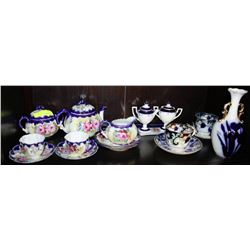 SHELF OF HANDPAINTED ESTATE ORNAMENTS ON CHOICE