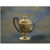 Image 1 : A George III oval shaped embossed silver coffee pot with acorn finial raised on a oval base Londo...