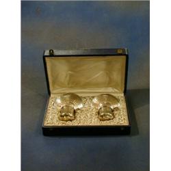 A pair of fine quality 19th Century French silver cups and saucers with engine turned decoration...
